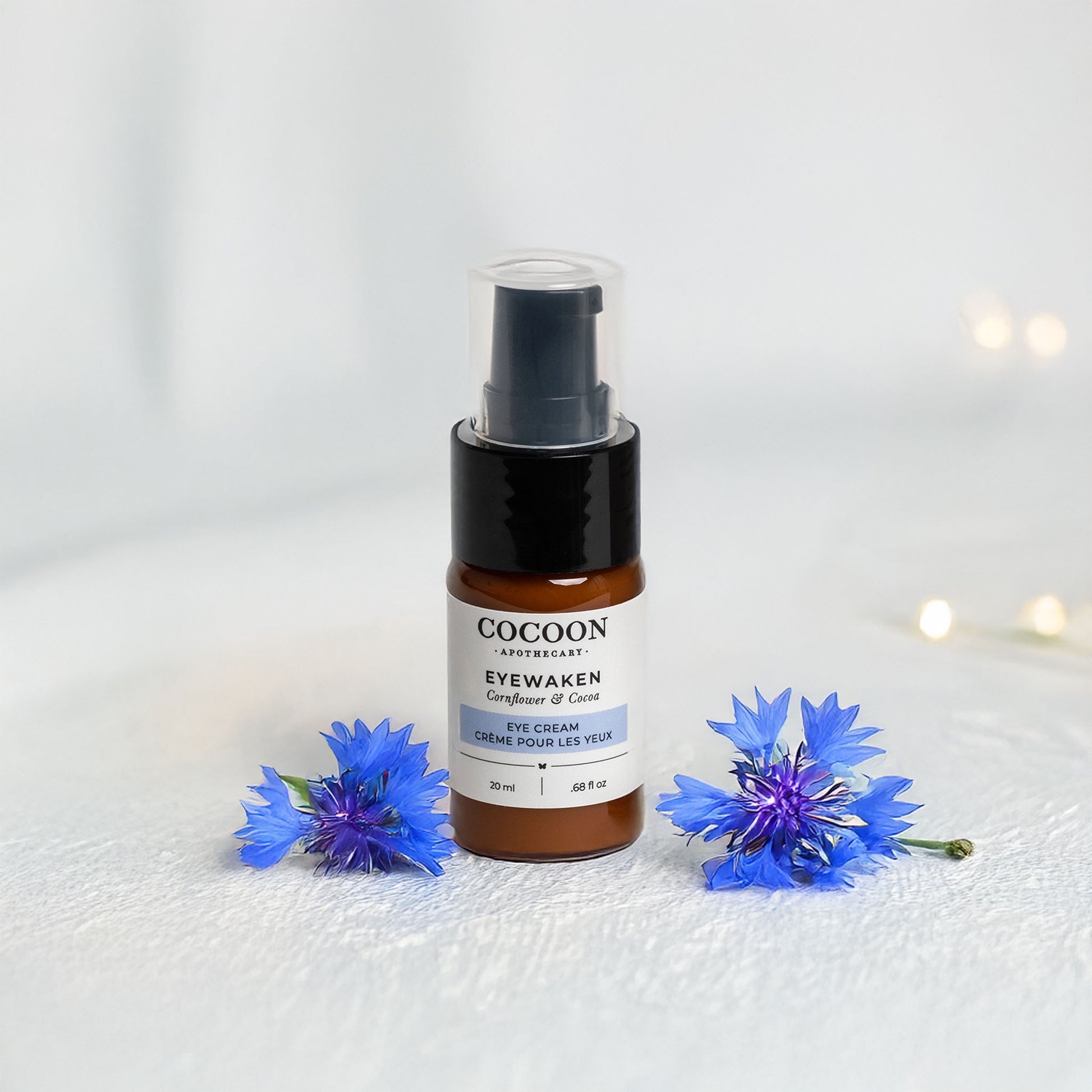 Eyewaken Eye Cream on vanity with botanical accents