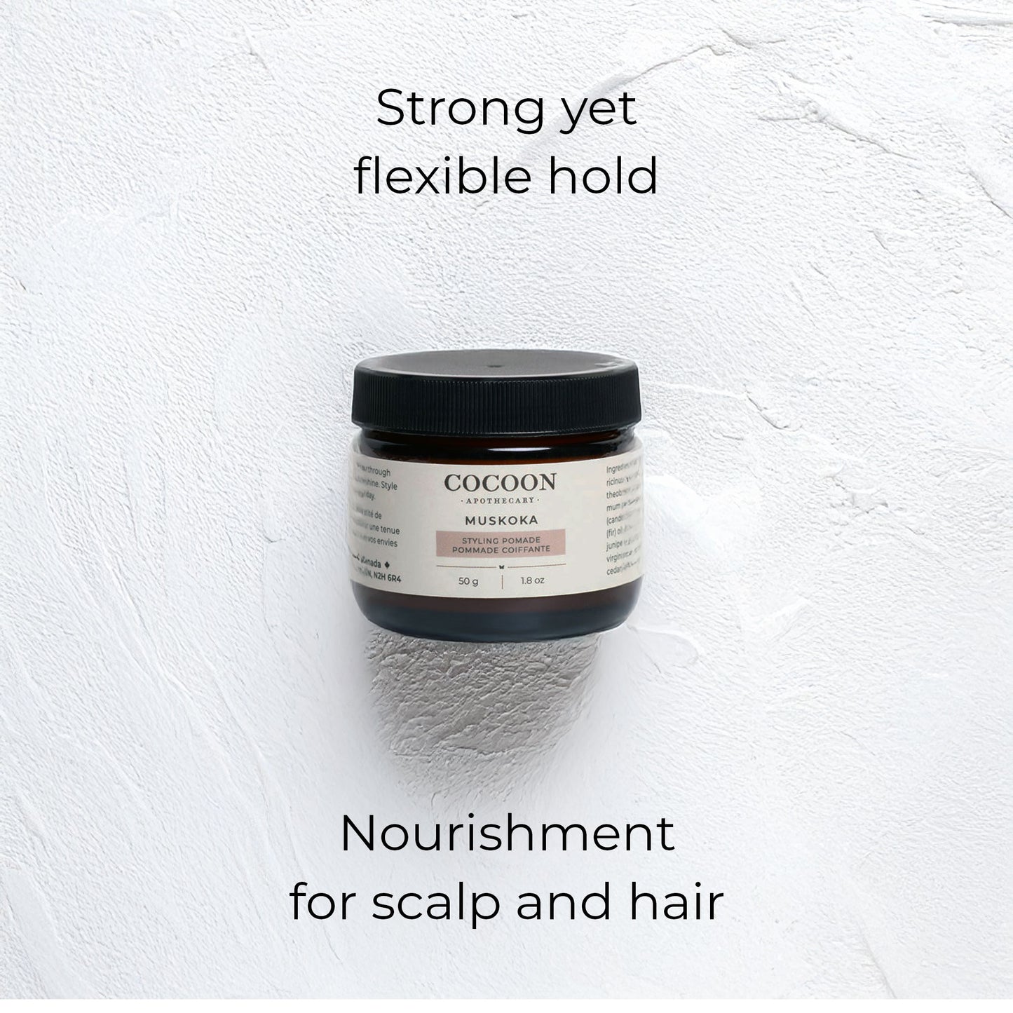 Close-up of Muskoka Styling Pomade texture with coconut oil and shea butter