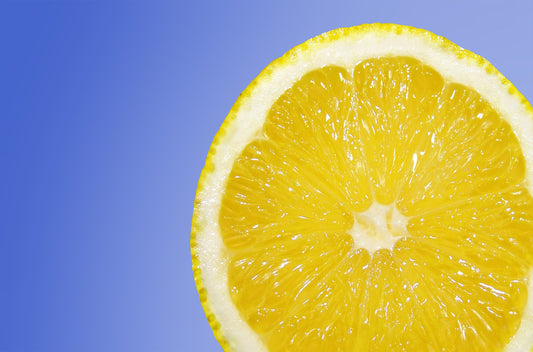 Lemon slice against blue background