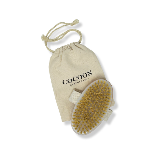 Close-up of sisal bristles on body brush showing texture and wood handle