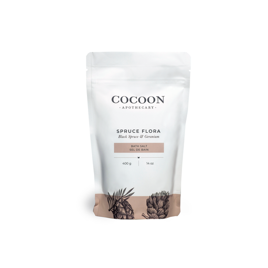 Cocoon Apothecary Spruce Flora bath salt packaging on a white background