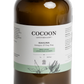 Close-up of Kahuna Body Lotion glass pump and label highlighting Ecocert certification and sustainable packaging.