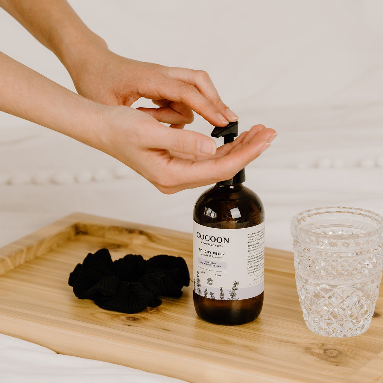 Bathroom vanity scene with Touchy Feely Hand Soap bottle