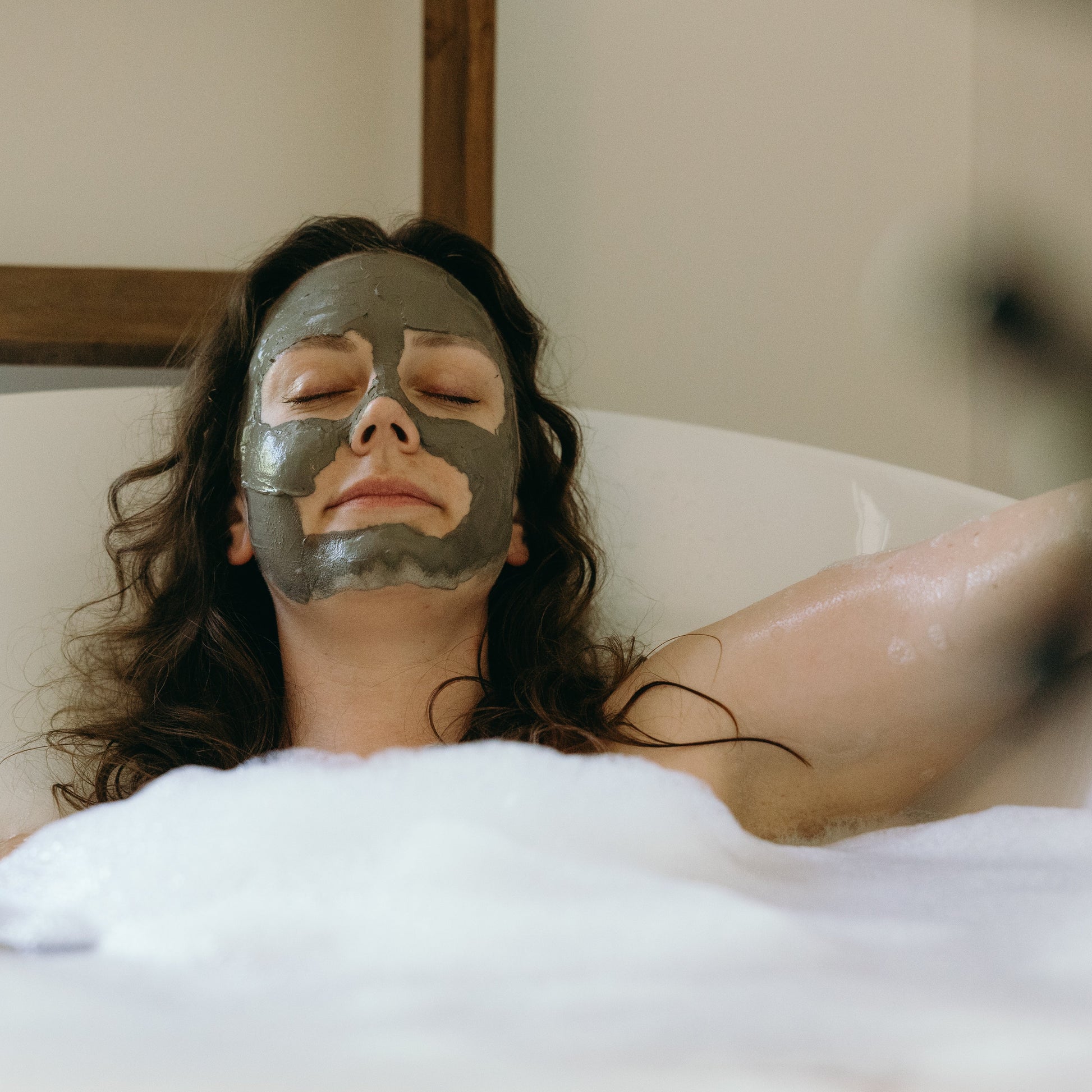 woman relaxing in a natural bubble bath
