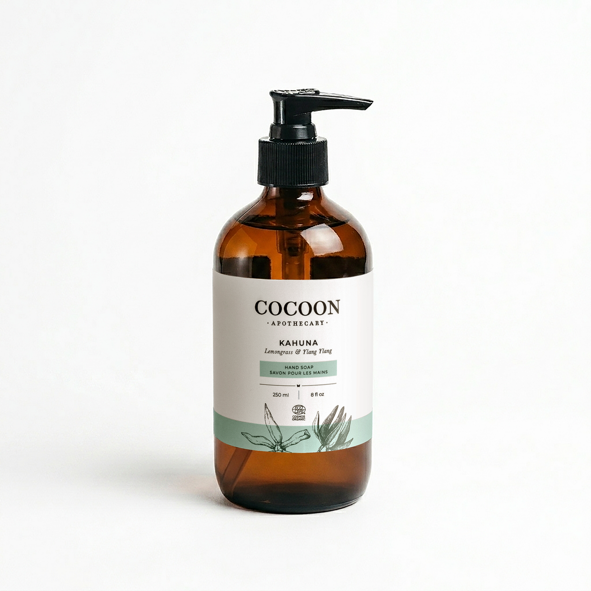 Brown bottle with pump and 'Cocoon' label on a white background