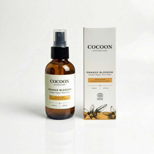 Cocoon Apothecary Orange Blossom facial toner bottle and packaging on a white background