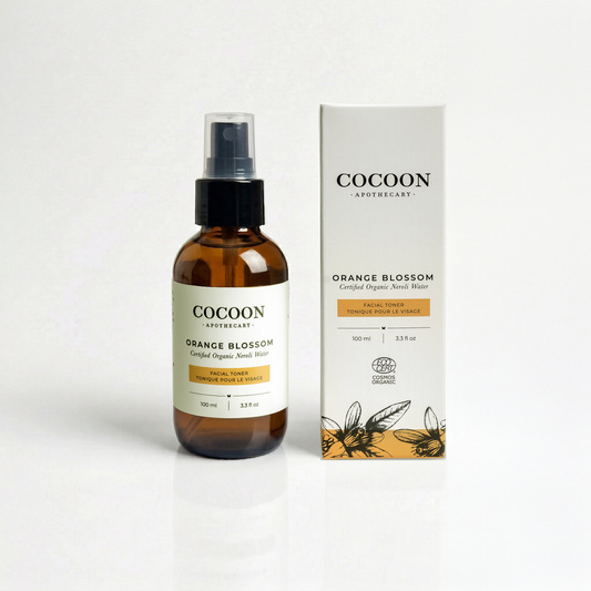 Cocoon Apothecary Orange Blossom facial toner bottle and packaging on a white background