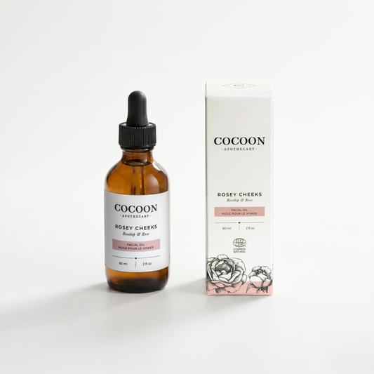Cocoon Rosey Cheeks Facial Oil bottle and packaging on a white background