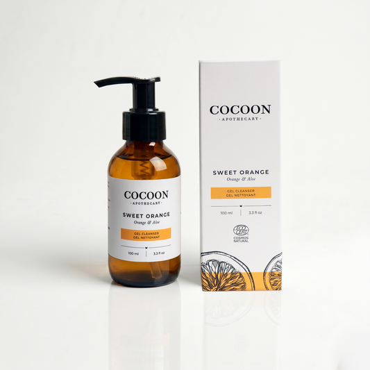 Cocoon Apothecary Sweet Orange product with bottle and packaging on a white background